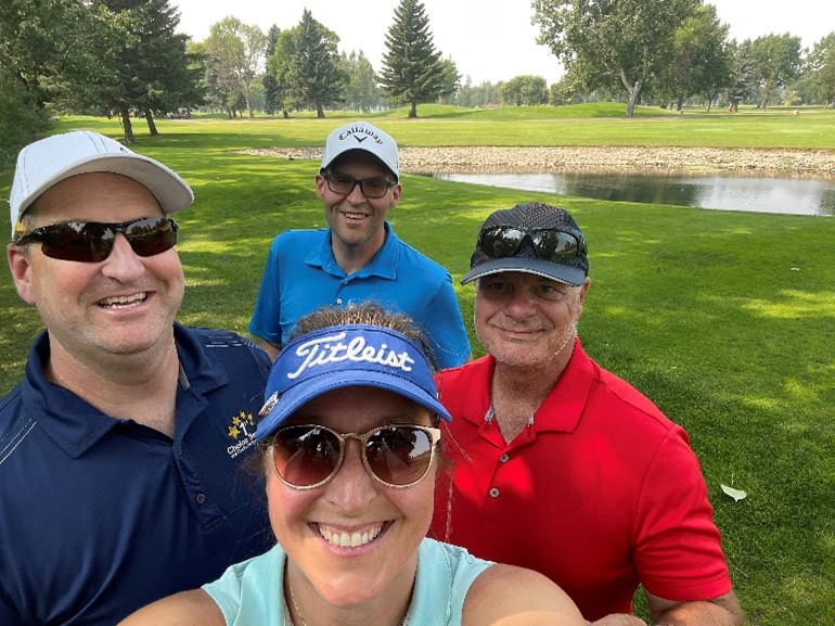 golfers smiling at camera