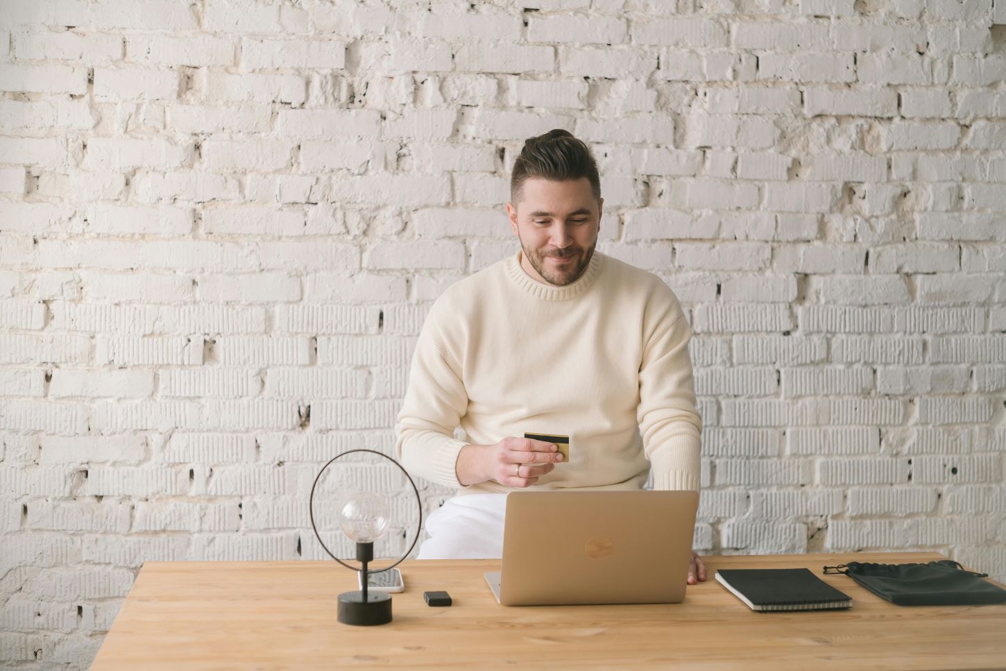 man using online credit card portal