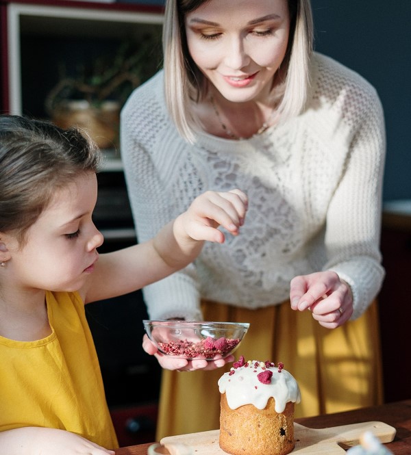 woman baking with daughter